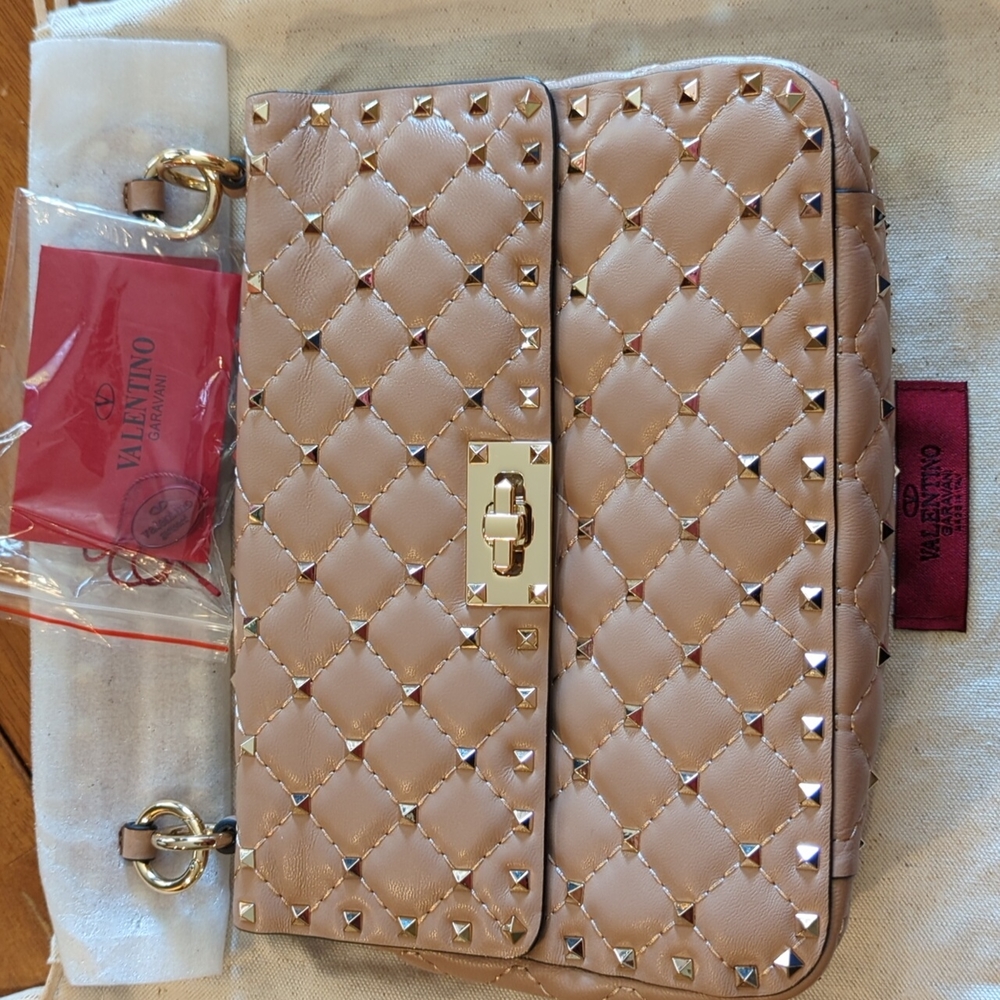 Blush Valentino Rockstud crossbody handbag.